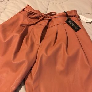 Anthropologie vegan leather pants